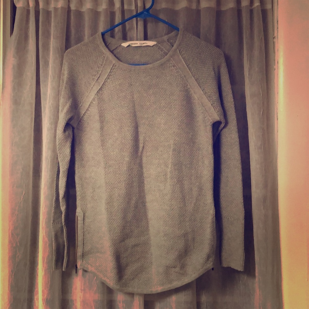 Athleta sweater with zippers in the side
